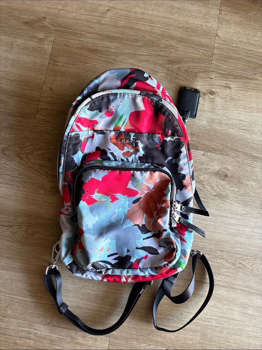 Preowned Tumi sling/backpack
